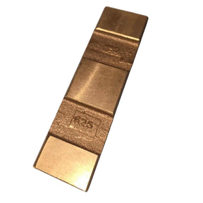 091624 Vane bronze metal pump component with flat rectangular shape, raised sections, and engraved marking